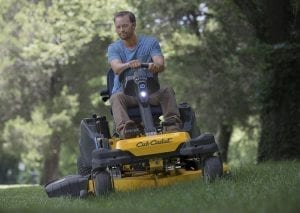 RZT SX Man plowing snow with snowblower